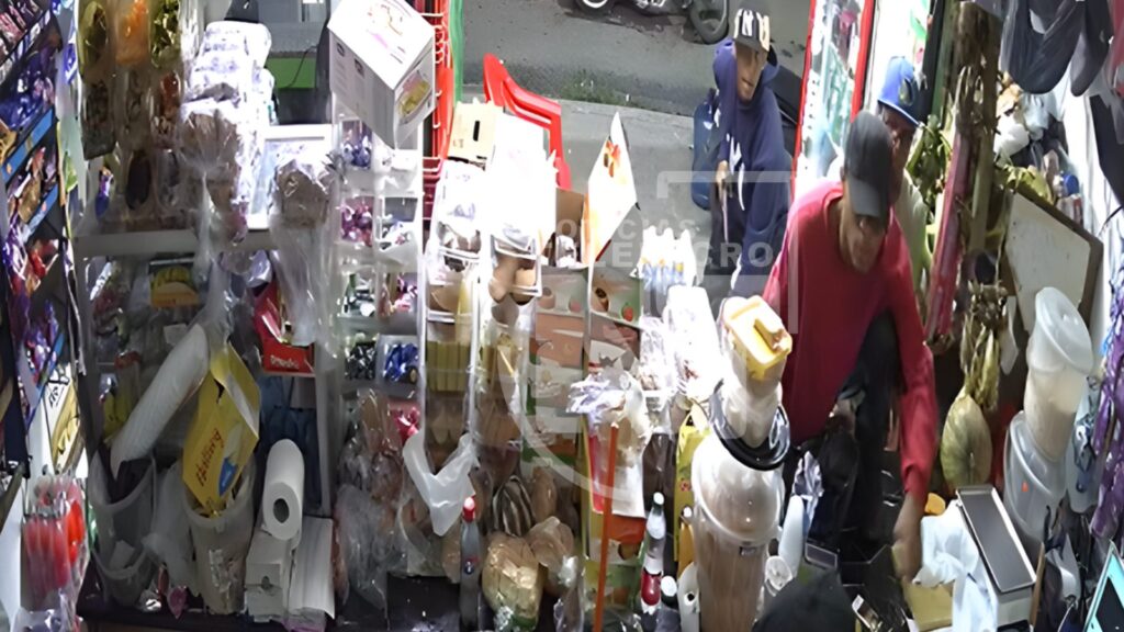 video:-a-punta-de-pistola,-hombres-asaltan-colmadero-en-san-cristobal
